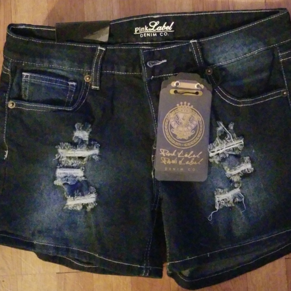 NWT. Pink Label denim distressed shorts